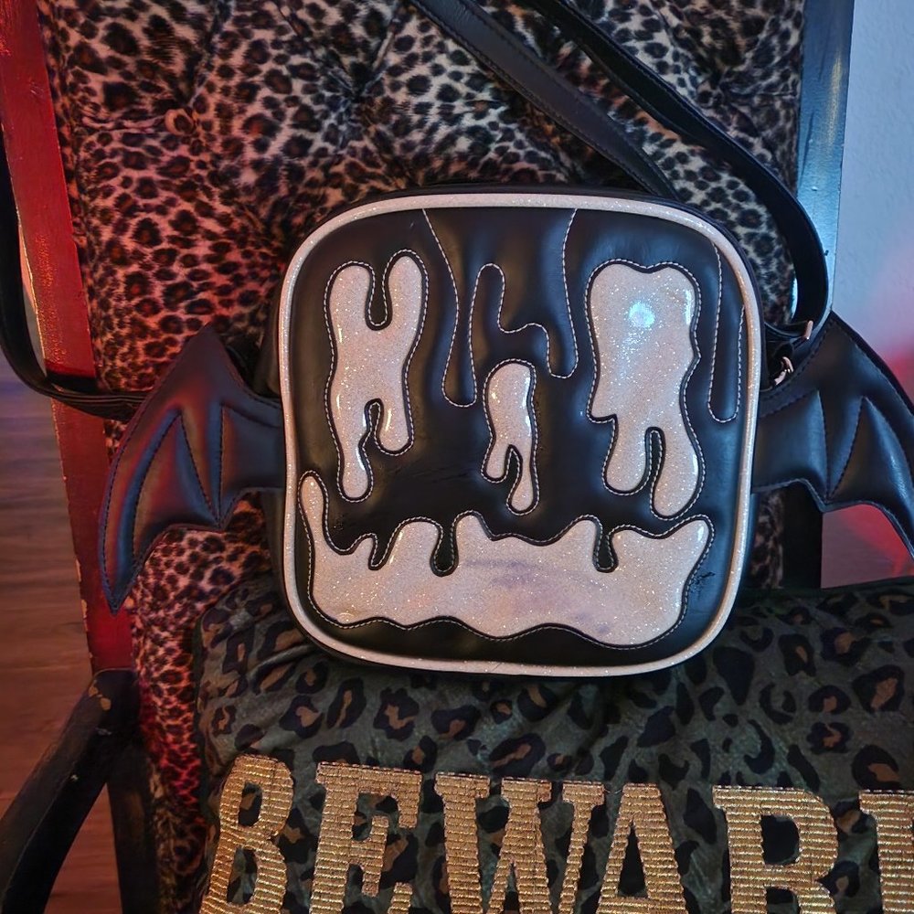 Limited Edition Love, Pain, & Stitches Batwing Bag
